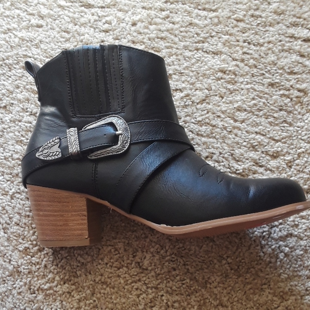 Torrid buckle ankle booties. Never been worn